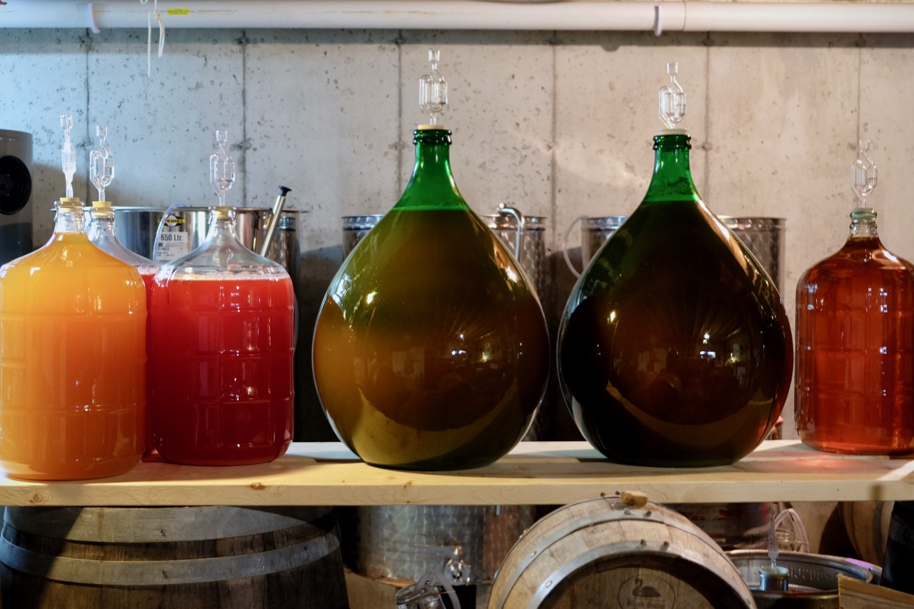 Carboys in Teddy Weber's home cidery in Roxbury, Vermont