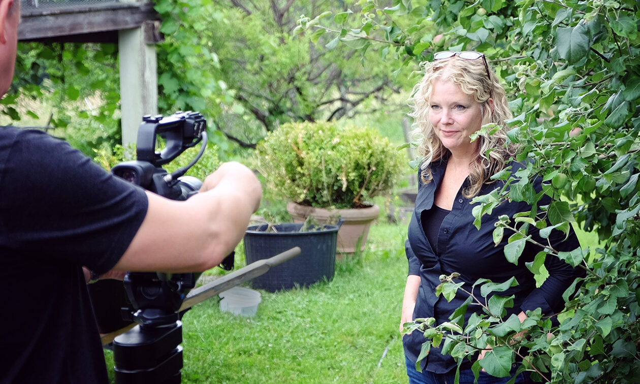 Deirdre Heekin being filmed among her apple trees