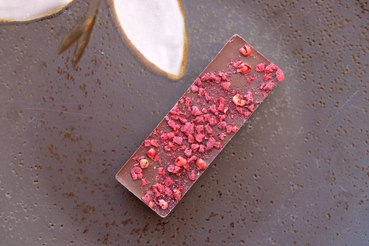 Pink peppercorns on a Tavernier chocolate bar